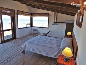Postel nebo postele na pokoji v ubytování La Posada