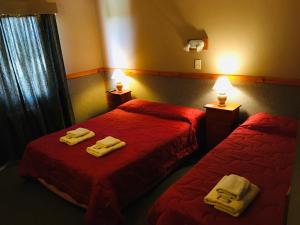 Cama ou camas em um quarto em Hotel Koi Mahik