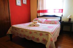Cama ou camas em um quarto em Pousada Toca das Bromelias
