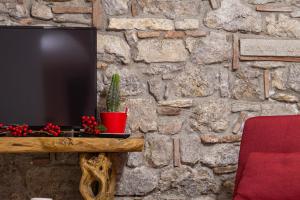 TV a/nebo společenská místnost v ubytování B&B Continanza
