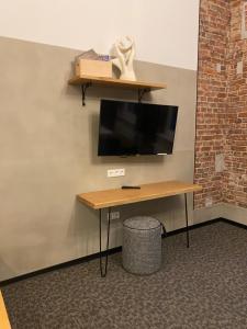 TV a/nebo společenská místnost v ubytování KobyApartment LUX