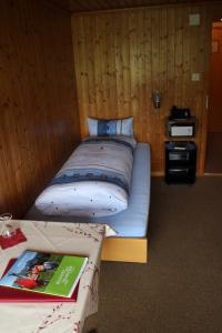 Ein Bett oder Betten in einem Zimmer der Unterkunft Hotel Kaubad