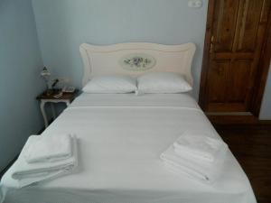 Postel nebo postele na pokoji v ubytování Kidalyo Hotel - Special Category