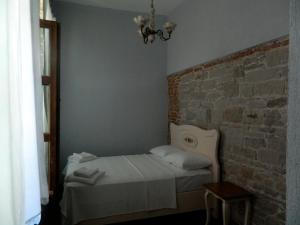 Postel nebo postele na pokoji v ubytování Kidalyo Hotel - Special Category
