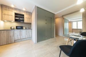 Kuchyň nebo kuchyňský kout v ubytování APARTVIP Akademicka