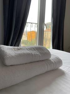 Een bed of bedden in een kamer bij Casa iulia