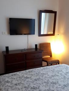 Et tv og/eller underholdning på Cómoda casa con inmejorable ubicación