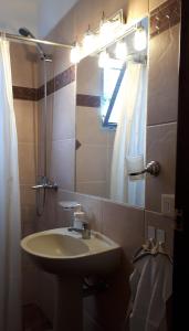 Et badeværelse på Cómoda casa con inmejorable ubicación + 17 billeder