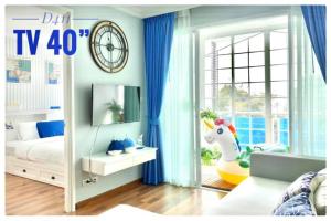 En eller flere senge i et værelse på My Resort Huahin by D411