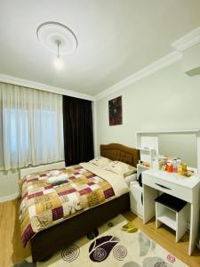 A bed or beds in a room at Airport Guest House