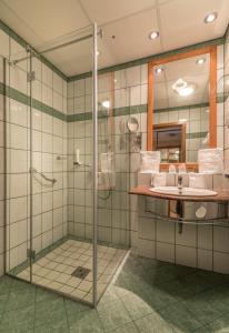 Koupelna v ubytování Hotel Spa Hévíz