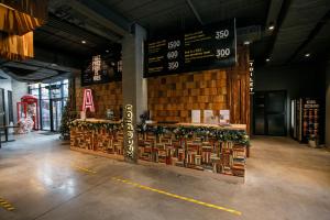 a store with a display of products in a building at Campus Community A-Hotel in Kyiv