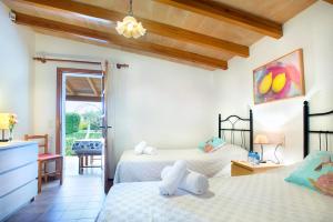 Posteľ alebo postele v izbe v ubytovaní Owl Booking Villa Xisca - 18 min Walk to the Old Town + 21 fotografií