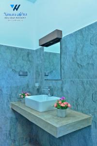 Kylpyhuone majoituspaikassa Nuwara Wewa Holiday Resort