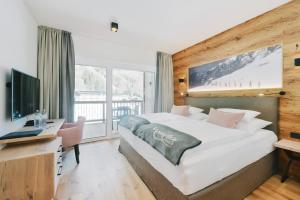 TV a/nebo společenská místnost v ubytování Venediger Lodge