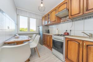 Kuchyňa alebo kuchynka v ubytovaní House Managers - Nadmorski - z widokiem na morze