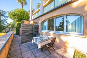 A balcony or terrace at Apartments Gelsomino, Orchidea and Magnolia