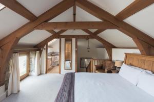 Katil atau katil-katil dalam bilik di Widecombe Cottage