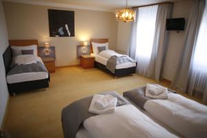 Letto o letti in una camera di Hotel Pod Vlekem
