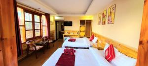 Postel nebo postele na pokoji v ubytování Dang Khoa Garden Inn Homestay