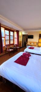 Postel nebo postele na pokoji v ubytování Dang Khoa Garden Inn Homestay