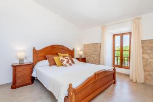 A bed or beds in a room at Finca Sa Real by Mallorca House Rent