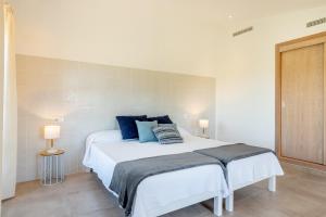 A bed or beds in a room at Finca Sa Real by Mallorca House Rent