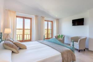 A bed or beds in a room at Finca Sa Real by Mallorca House Rent Még 31 kép