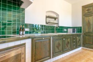 A kitchen or kitchenette at Finca Sa Real by Mallorca House Rent