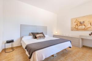 A bed or beds in a room at Finca Sa Real by Mallorca House Rent