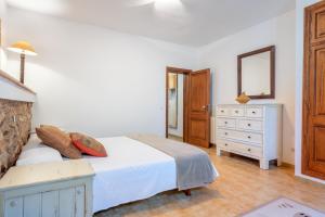 A bed or beds in a room at Finca Sa Real by Mallorca House Rent