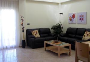 A seating area at Beachfront San Javier