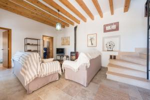 Televiisor ja/või meelelahutuskeskus majutusasutuses Finca Son Joan Jaume