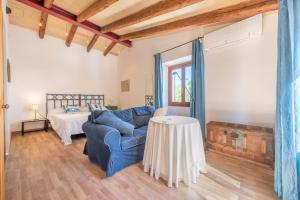 Voodi või voodid majutusasutuse Finca Son Joan Jaume toas +35 fotot