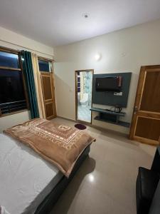 TV a/nebo společenská místnost v ubytování Ranas B&B + 31 fotografií