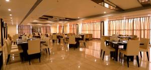 A restaurant or other place to eat at The Fern Residency Haridwar