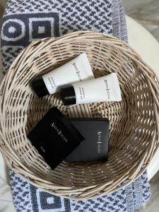 a basket with three products on a table at Hotel Koutriaris in Distomo