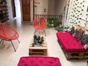 Posezení v ubytování Hospedaje Casa Rosa Jardín