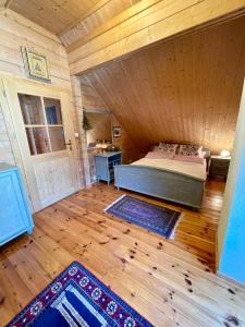 Tempat tidur dalam kamar di Pod Salamandrom