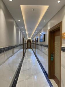 a hallway of a building with a bowling alley at منازل اليتا in Ar Rabwah