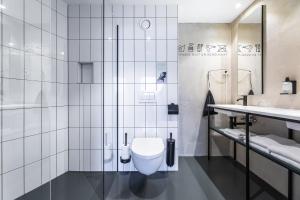 Koupelna v ubytování Gooiland Hotel