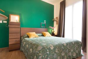 Llit o llits en una habitació de Il Sogno Apartments