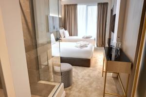 Katil atau katil-katil dalam bilik di Hotel Mirror