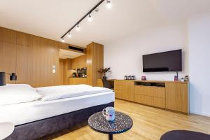 Televízia a/alebo spoločenská miestnosť v ubytovaní VacationClub – Seaside Apartament 505