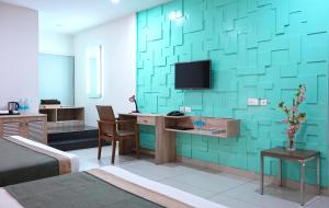 TV a/nebo společenská místnost v ubytování M Stays + 23 fotografií