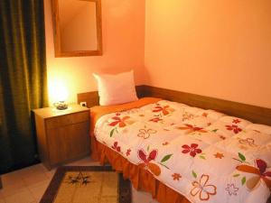 Ένα ή περισσότερα κρεβάτια σε δωμάτιο στο Hotel Vesta +1 φωτογραφίες