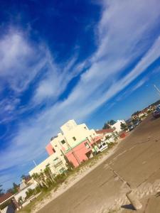 a group of buildings on the side of a street at Hotel Vista La Floresta in La Floresta