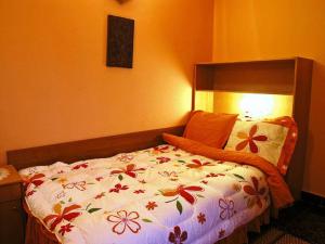 Ένα ή περισσότερα κρεβάτια σε δωμάτιο στο Hotel Vesta