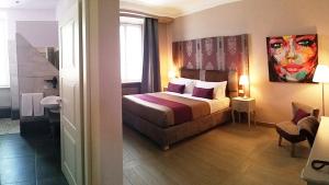 Postel nebo postele na pokoji v ubytování Halex room&food