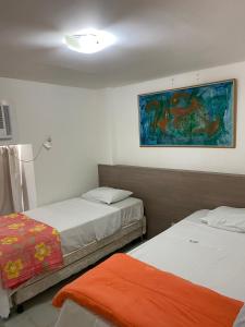 Voodi või voodid majutusasutuse Ancorar Flat Resort 3Q toas